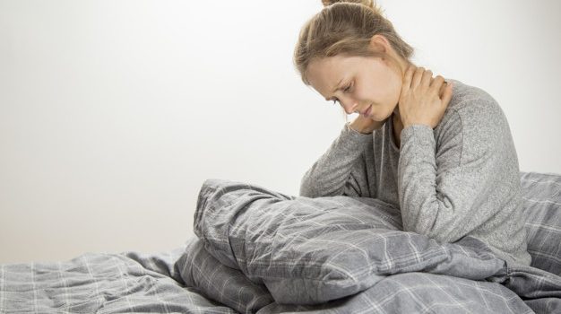 Frustrated girl feeling neck ache