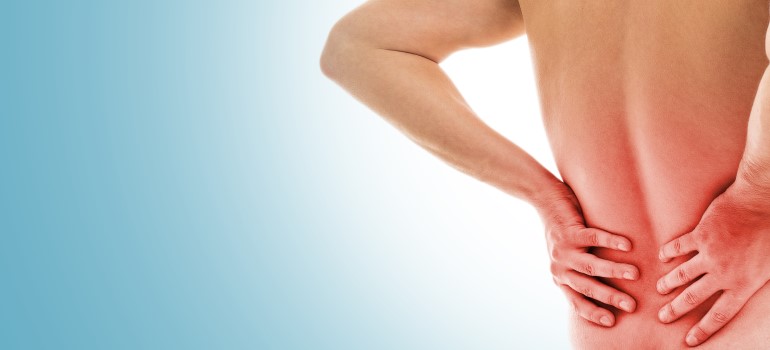 man-holds-his-back-due-pain