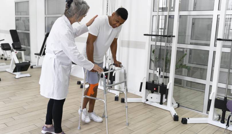 Physiotherapist guiding spine pain exercises for recovery