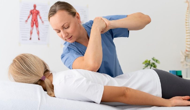 Bad back physio session focusing on postural correction.