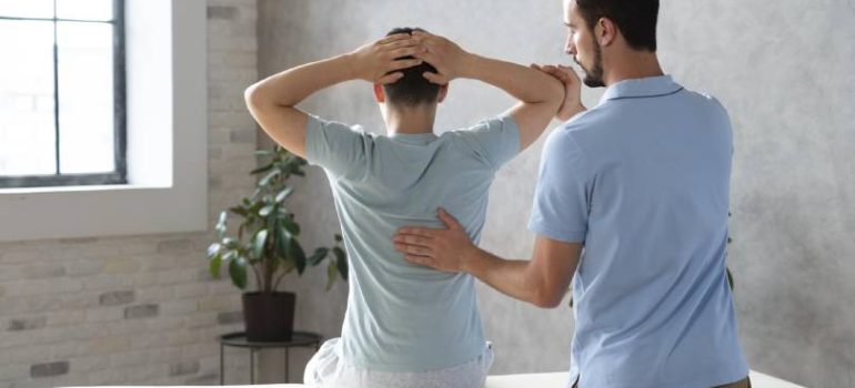 Patient receiving spinal therapy for nerve decompression