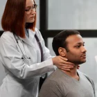 physiotherapist-guiding-stiff-neck-therapy