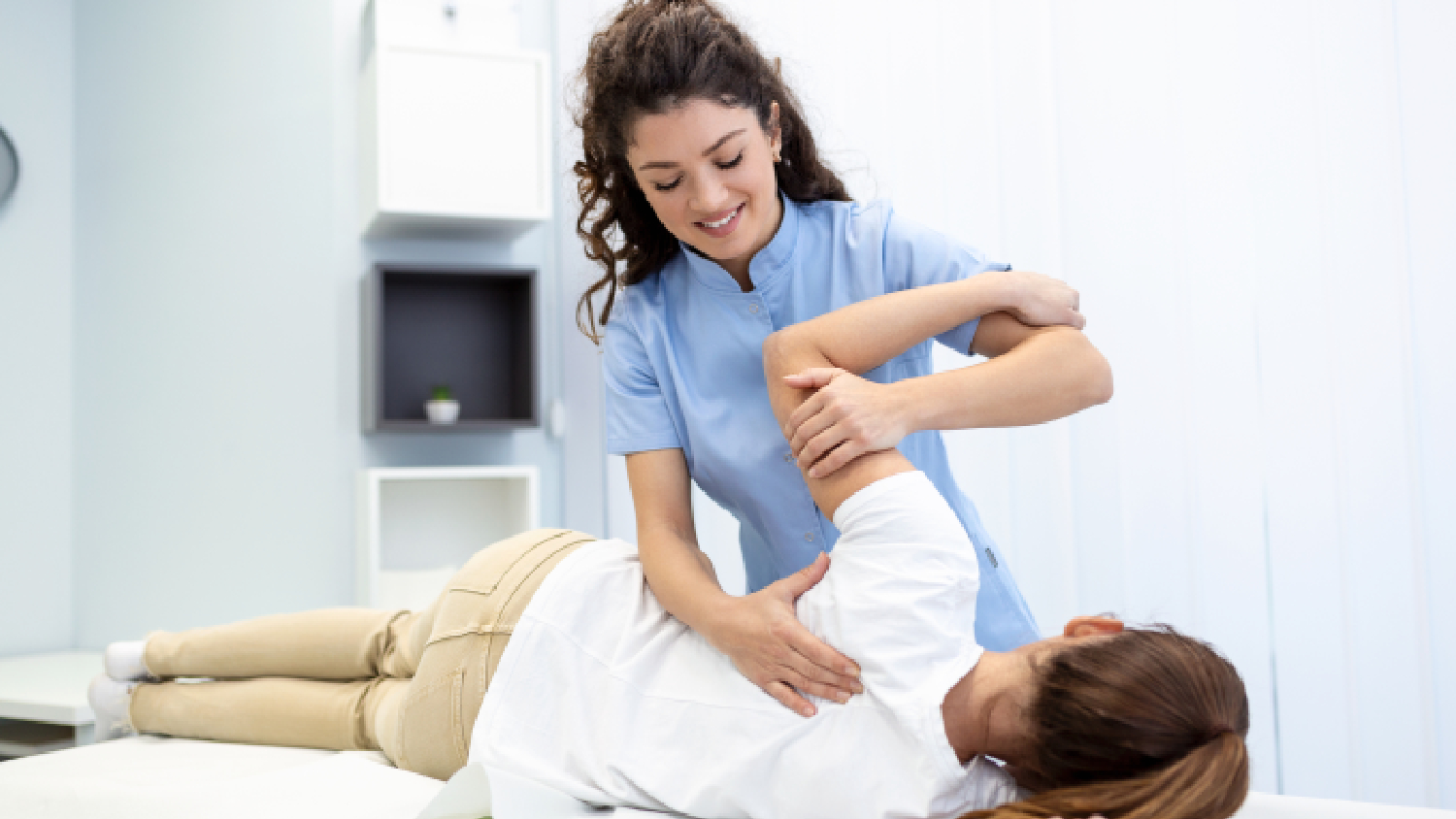 physiotherapist-performing-manual-therapy-for-lower-back-pain-relief