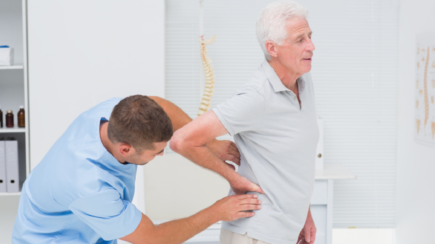 spine-specialist-physical-therapy-performing-manual-vertebral-mobilization
