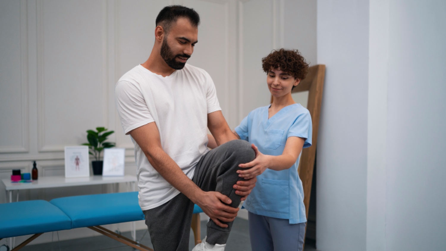 physiotherapist-applying-manual-mobilization-to-a-patients-ankle-joint