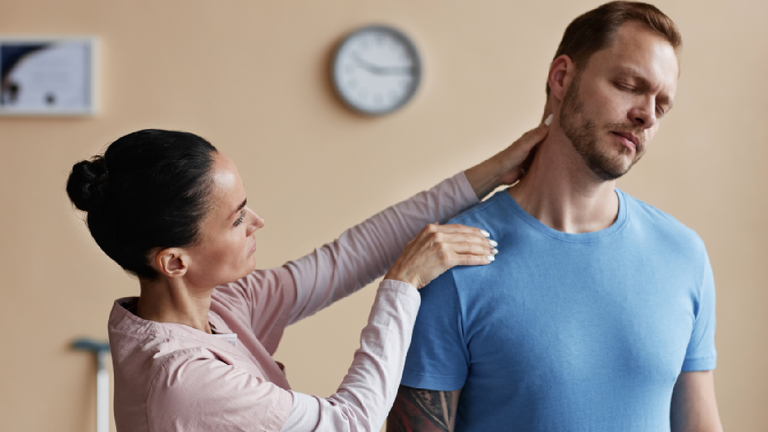 physiotherapist-performing-manual-mobilization-on-a-patients-cervical-spine-for-stiff-neck-physiotherapy