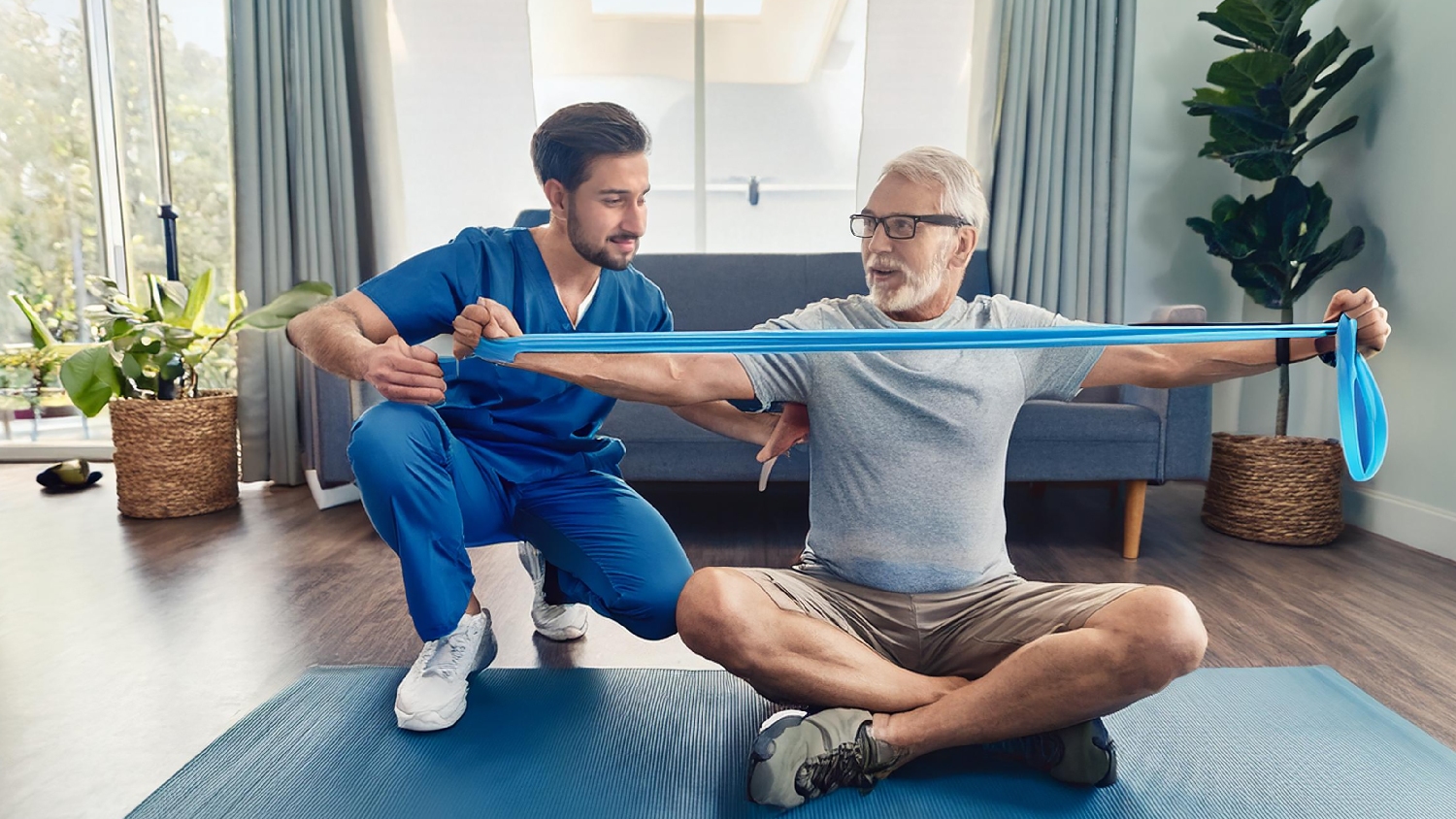 physiotherapist-guiding-passive-range-of-motion-exercises-for-a-patient-with-a-fractured-humerus