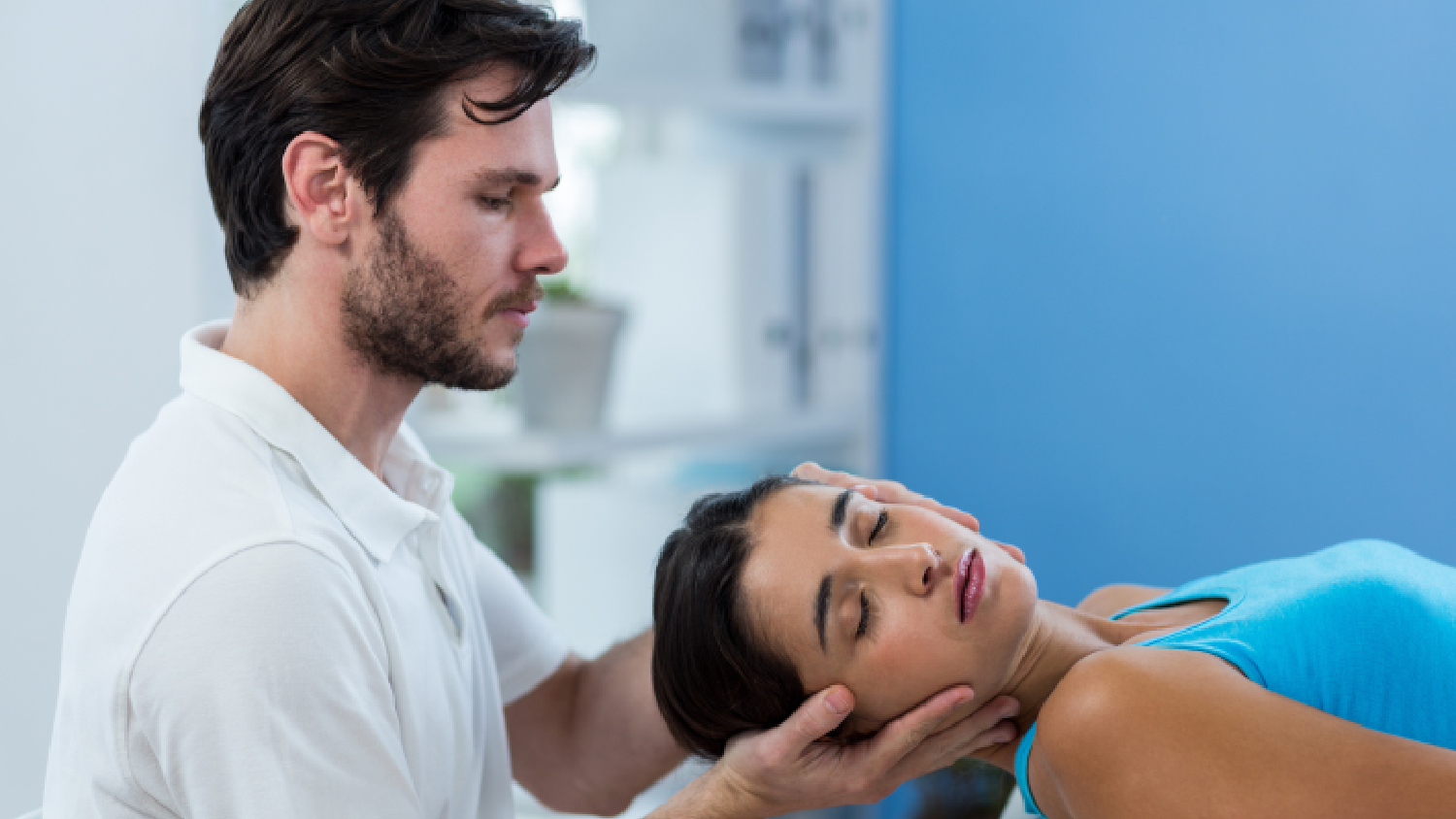 physiotherapist-performing-gentle-mobilization-for-physiotherapy-for-cervical-spondylitis