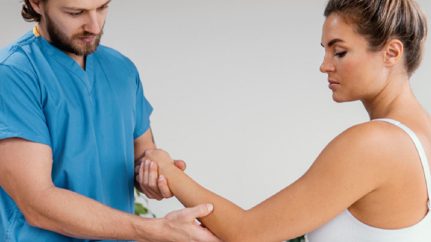 physiotherapist-applying-gentle-joint-mobilization-techniques-for-frozen-shoulder-treatment