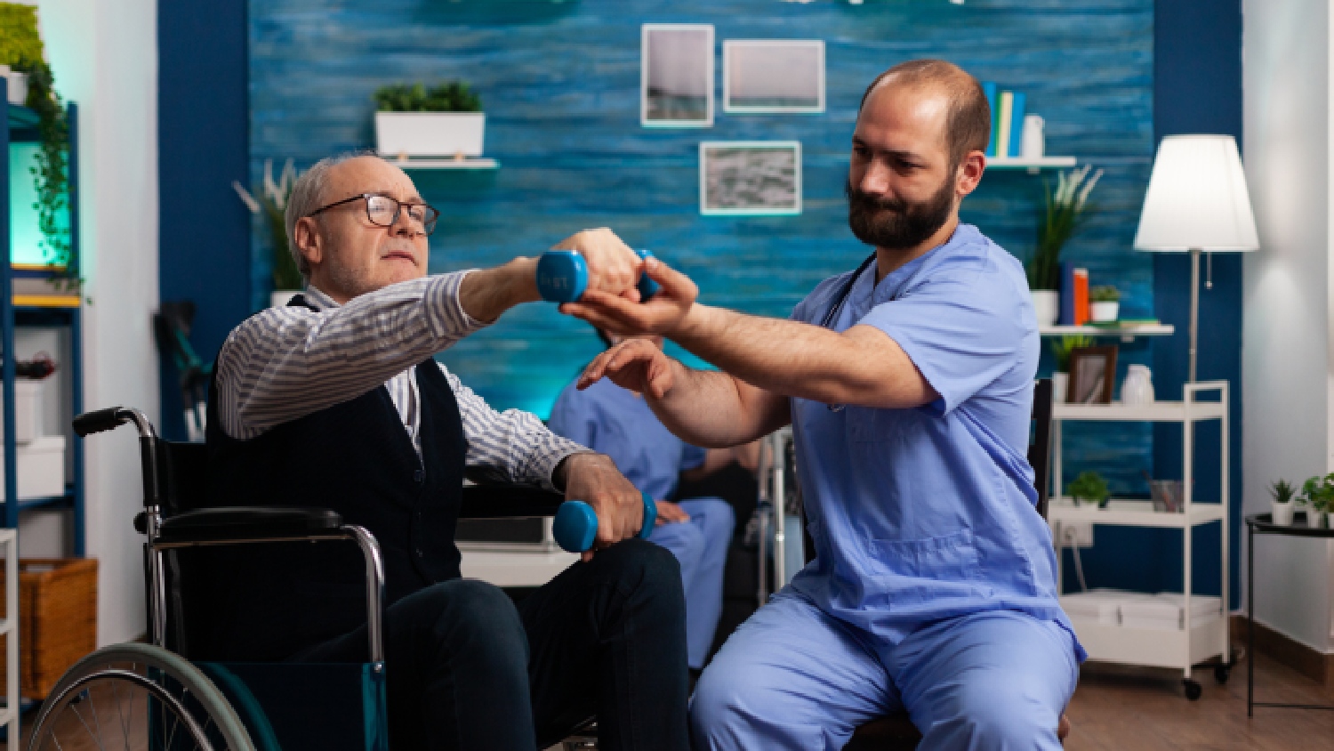 physiotherapist-guiding-passive-range-of-motion-exercises-for-a-patient-with-a-fractured-humerus