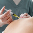 illustration-of-an-epidural-steroid-injection-reducing-inflammation-around-a-spinal-nerve-root